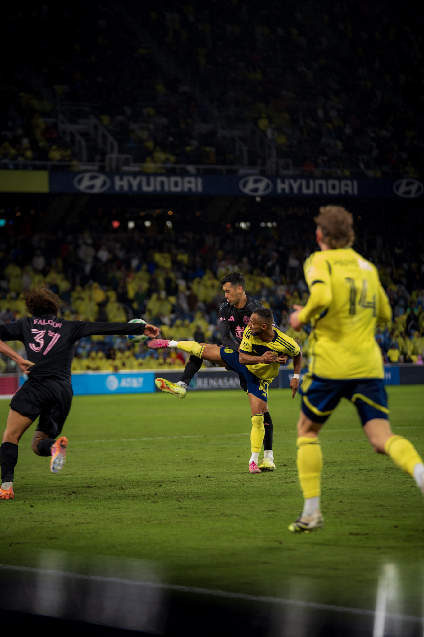 Footballer carrying the ball during a match